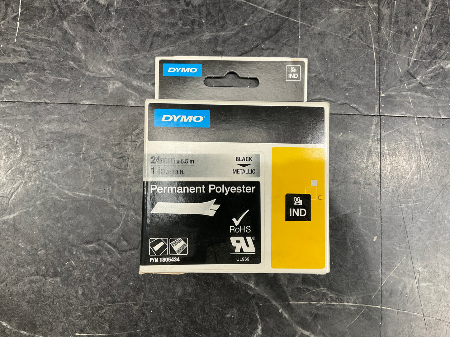 Dymo-Rhino-Permanent-Polyester-Tape--Black-on-Metallic-