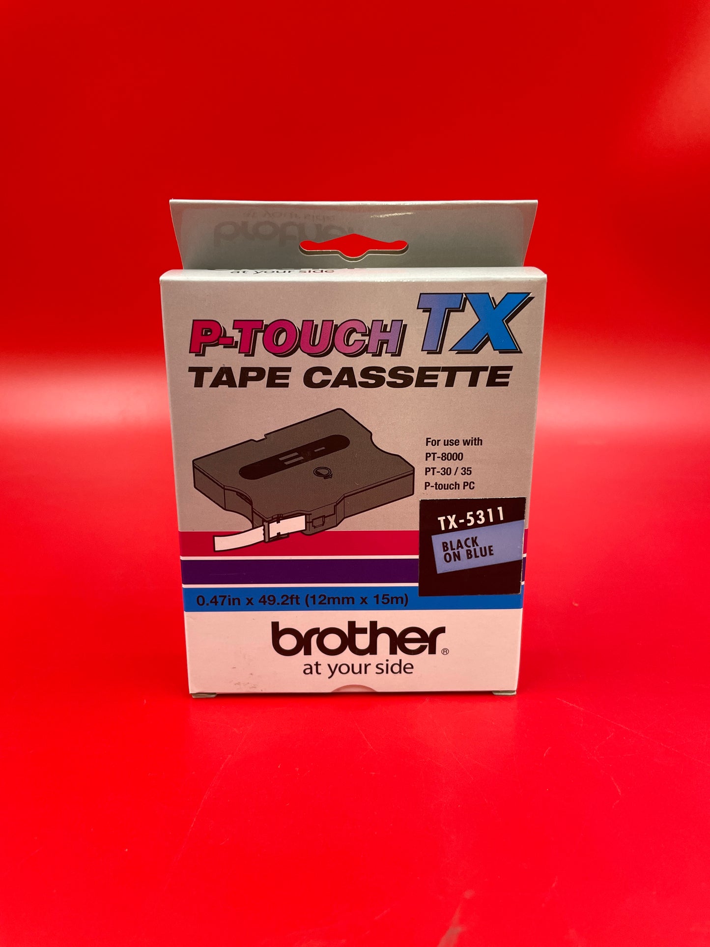Brother-P-Touch-TX-Tape-Caseette--Black-on-Blue-