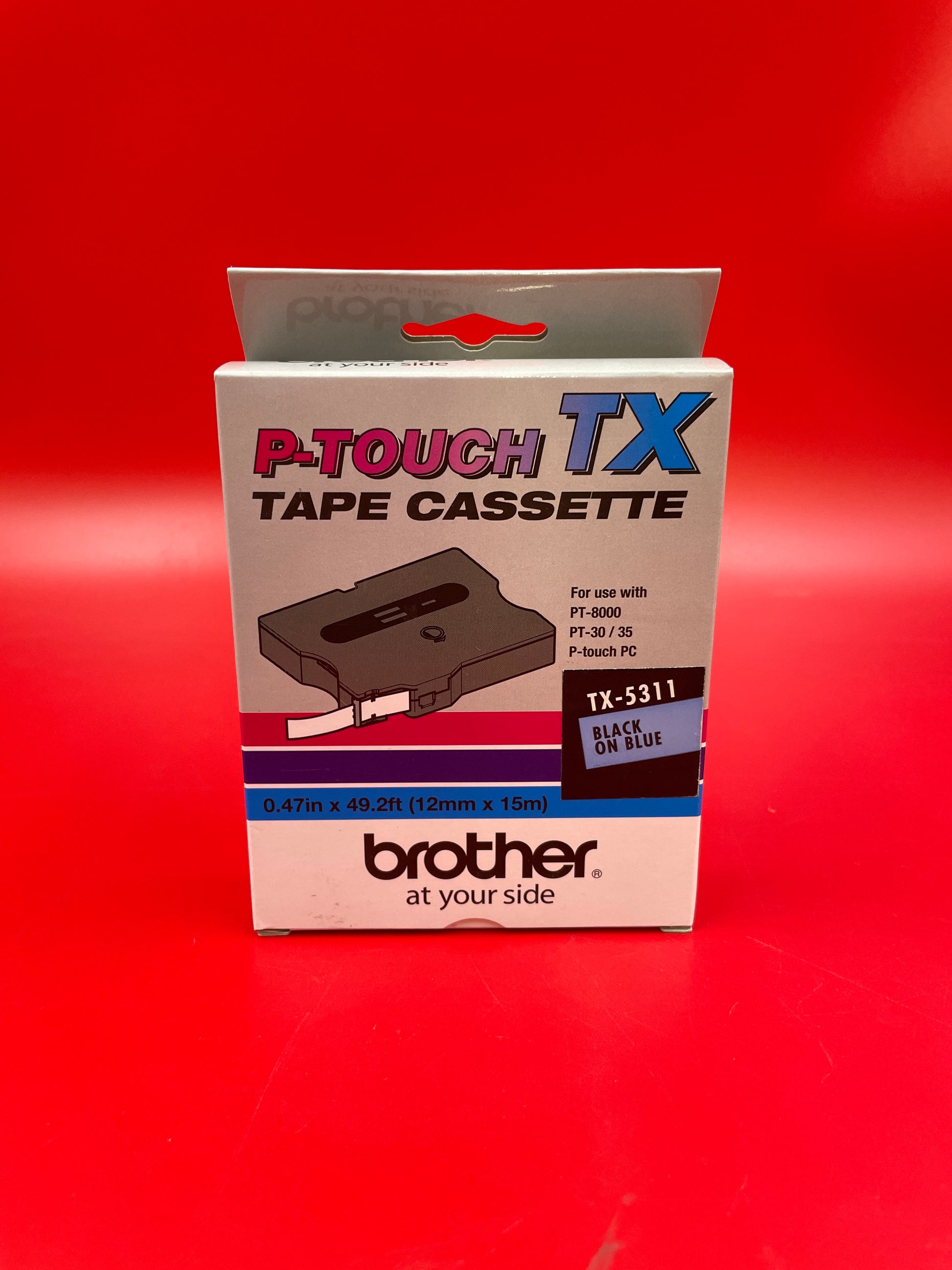 Brother-P-Touch-TX-Tape-Caseette--Black-on-Blue-